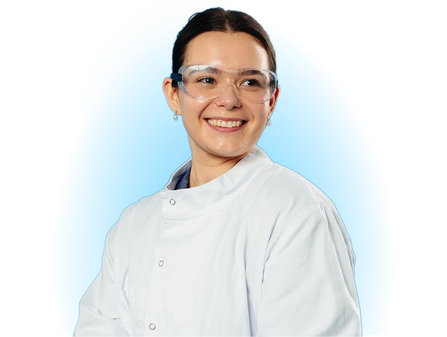 A Woman Wearing a Lab Coat and Glasses, Focused on Her Work in a Laboratory Setting (1)