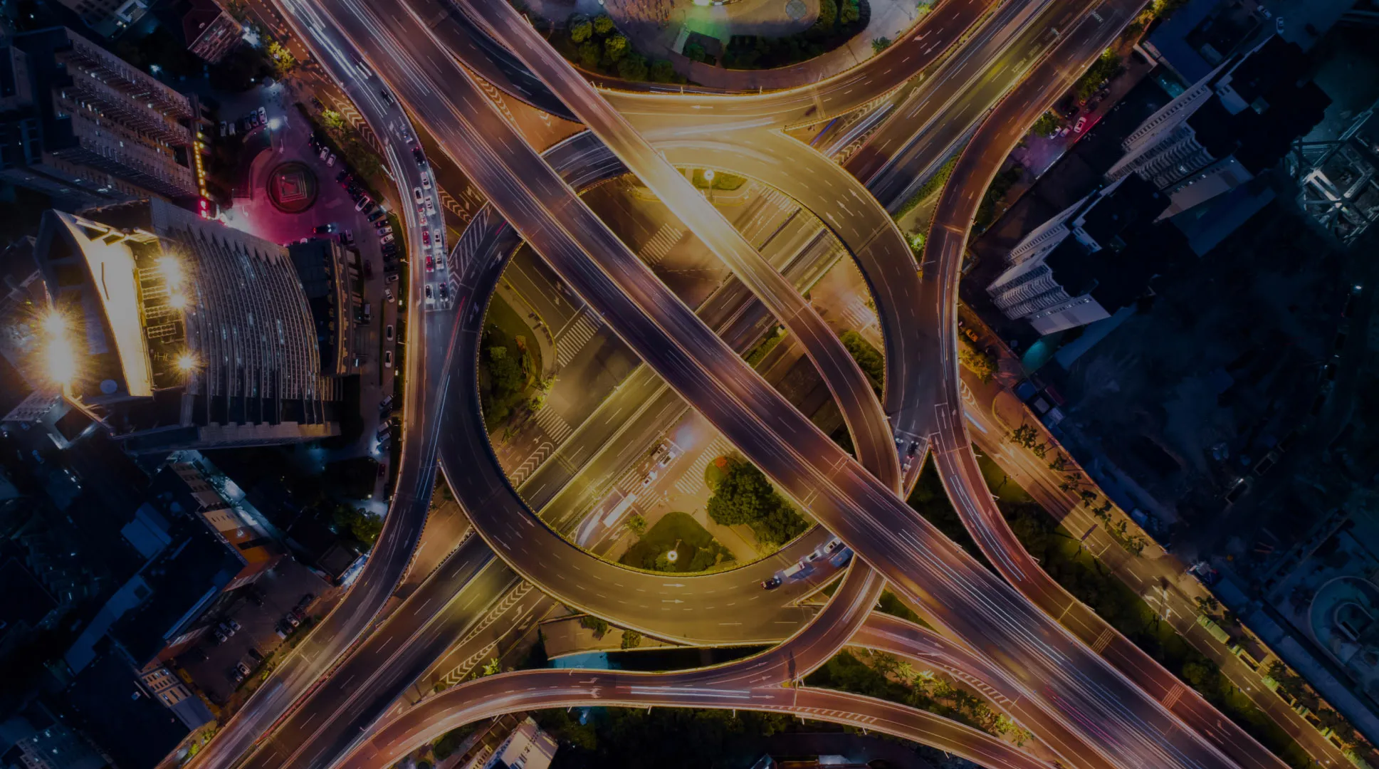 Birdseye view of motorway roads intersecting at nice with cars